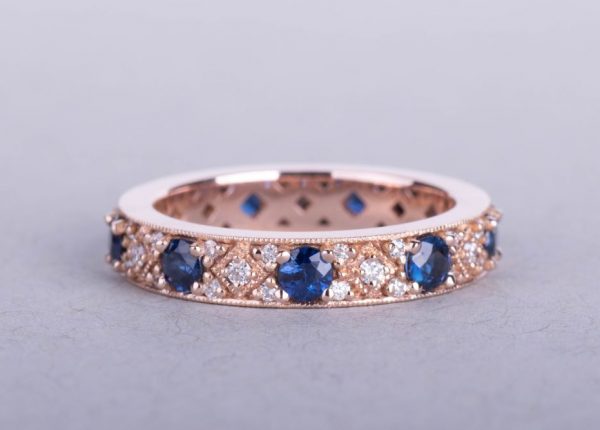 Blue sapphire and diamond ring, crafted in 18ct rose gold