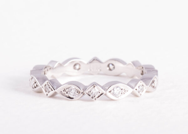 Square and pear diamond wedding ring